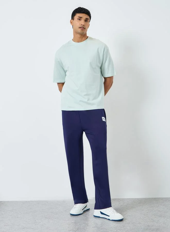Styli Men Light Blue Oversized Graphic T-Shirt
